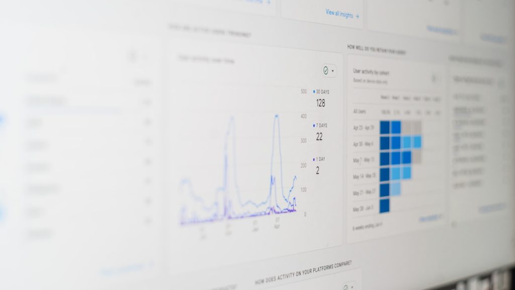 Analytics dashboard showing automated SEO reporting data on a screen