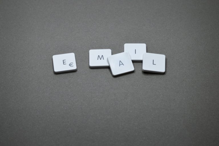 The word "email" is spelled out with letter tiles