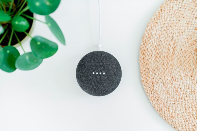 chalk Google Home Mini on white surface